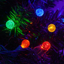 Cargar imagen en el visor de la galería, multicolored G12 faceted lights installed in a tree
