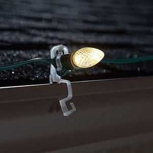 omni clip attached to green wire night time